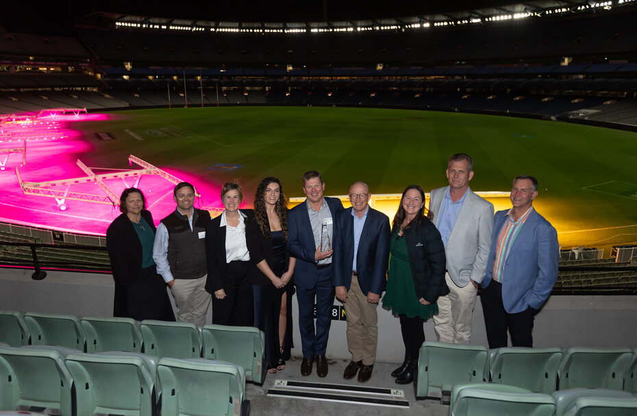 Tanuki team photo at the MCG, after accepting their award.